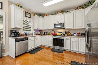 Adorable ranch home located in beautiful gated and golf on Carolina Trace Country Club in North Carolina - for sale on GolfHomes.com, golf home, golf lot