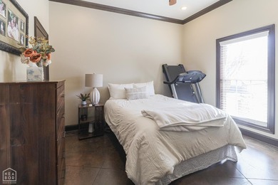 Stunning updated executive home with sunroom and screened porch on Sage Meadows Golf Course in Arkansas - for sale on GolfHomes.com, golf home, golf lot