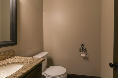 Stunning updated executive home with sunroom and screened porch on Sage Meadows Golf Course in Arkansas - for sale on GolfHomes.com, golf home, golf lot