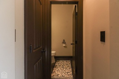 Stunning updated executive home with sunroom and screened porch on Sage Meadows Golf Course in Arkansas - for sale on GolfHomes.com, golf home, golf lot