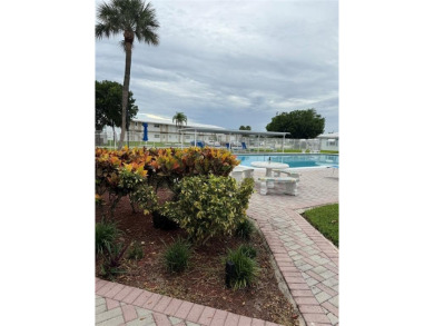 Beautifully maintained 2-bedroom, 1-bath first-floor condo with on Leisureville Community Association in Florida - for sale on GolfHomes.com, golf home, golf lot