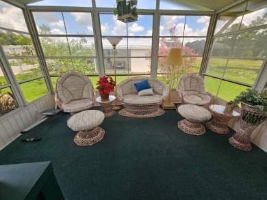 This move in ready, 2-bedroom/2 bath home is situated on a large on Big Cypress Golf and Country Club in Florida - for sale on GolfHomes.com, golf home, golf lot