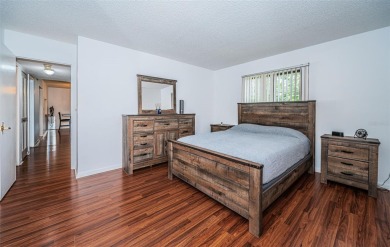 Welcome to your dream 55+ retirement retreat Located in Pine on Highland Lakes Executive Golf Course in Florida - for sale on GolfHomes.com, golf home, golf lot