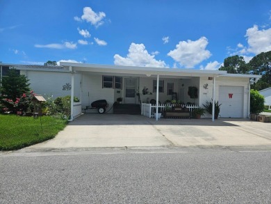 This move in ready, 2-bedroom/2 bath home is situated on a large on Big Cypress Golf and Country Club in Florida - for sale on GolfHomes.com, golf home, golf lot