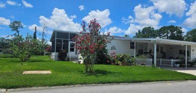 This move in ready, 2-bedroom/2 bath home is situated on a large on Big Cypress Golf and Country Club in Florida - for sale on GolfHomes.com, golf home, golf lot