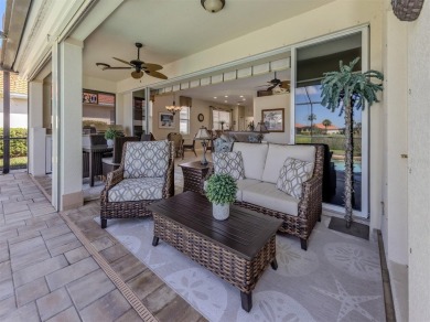 Stunning lake, golf and sunset views with maintenance-free on Venetian Golf and River Club in Florida - for sale on GolfHomes.com, golf home, golf lot