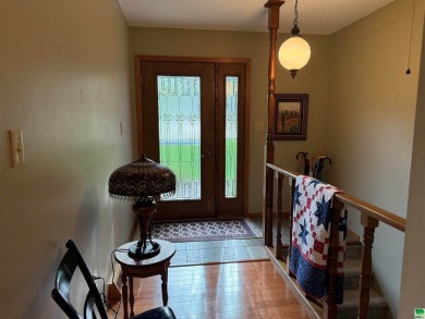 Let's take a look at 841 Country Club Dr. in Akron Iowa that's on Akron Golf Course in Iowa - for sale on GolfHomes.com, golf home, golf lot
