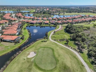 Stunning lake, golf and sunset views with maintenance-free on Venetian Golf and River Club in Florida - for sale on GolfHomes.com, golf home, golf lot