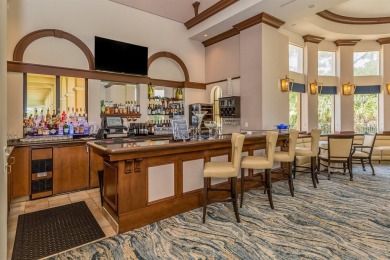Stunning lake, golf and sunset views with maintenance-free on Venetian Golf and River Club in Florida - for sale on GolfHomes.com, golf home, golf lot
