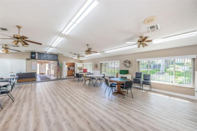 Welcome to your dream 55+ retirement retreat Located in Pine on Highland Lakes Executive Golf Course in Florida - for sale on GolfHomes.com, golf home, golf lot