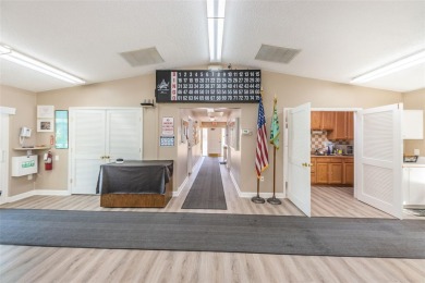 Welcome to your dream 55+ retirement retreat Located in Pine on Highland Lakes Executive Golf Course in Florida - for sale on GolfHomes.com, golf home, golf lot
