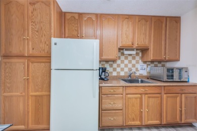 Welcome to your dream 55+ retirement retreat Located in Pine on Highland Lakes Executive Golf Course in Florida - for sale on GolfHomes.com, golf home, golf lot