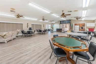Welcome to your dream 55+ retirement retreat Located in Pine on Highland Lakes Executive Golf Course in Florida - for sale on GolfHomes.com, golf home, golf lot