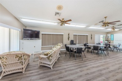 Welcome to your dream 55+ retirement retreat Located in Pine on Highland Lakes Executive Golf Course in Florida - for sale on GolfHomes.com, golf home, golf lot