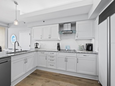 Set above the sparkling waters of Sarasota Bay, this beautifully on Longboat Key Golf Club Resort in Florida - for sale on GolfHomes.com, golf home, golf lot
