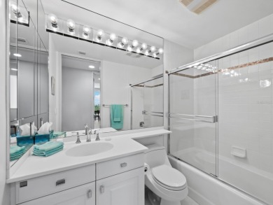 Set above the sparkling waters of Sarasota Bay, this beautifully on Longboat Key Golf Club Resort in Florida - for sale on GolfHomes.com, golf home, golf lot