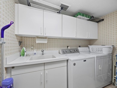 Set above the sparkling waters of Sarasota Bay, this beautifully on Longboat Key Golf Club Resort in Florida - for sale on GolfHomes.com, golf home, golf lot