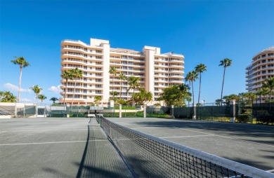 Set above the sparkling waters of Sarasota Bay, this beautifully on Longboat Key Golf Club Resort in Florida - for sale on GolfHomes.com, golf home, golf lot