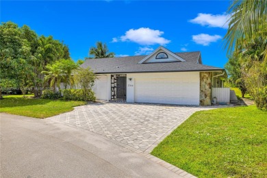 Freshly remodeled home on a quaint cul-de-sac, located in the on Woodlands Country Club in Florida - for sale on GolfHomes.com, golf home, golf lot