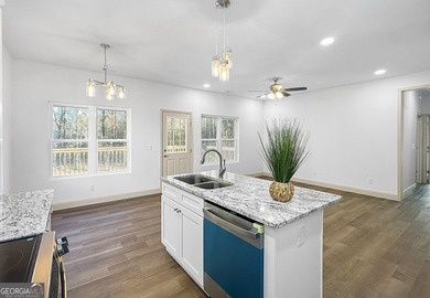 Welcome to 1532 Greentree Parkway, a newly constructed 3-bedroom on Golf Club of Macon in Georgia - for sale on GolfHomes.com, golf home, golf lot