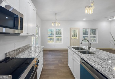 Welcome to 1532 Greentree Parkway, a newly constructed 3-bedroom on Golf Club of Macon in Georgia - for sale on GolfHomes.com, golf home, golf lot