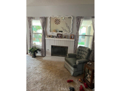 Tivioli Plan 200 on quiet street - upgraded cabinets in kitchen on Sun Lakes Country Club in California - for sale on GolfHomes.com, golf home, golf lot
