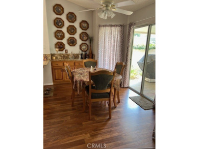 Tivioli Plan 200 on quiet street - upgraded cabinets in kitchen on Sun Lakes Country Club in California - for sale on GolfHomes.com, golf home, golf lot