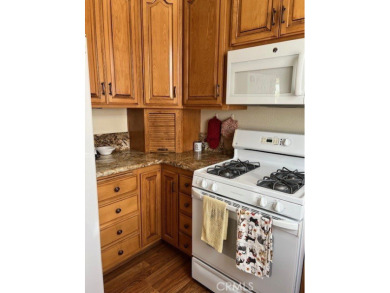 Tivioli Plan 200 on quiet street - upgraded cabinets in kitchen on Sun Lakes Country Club in California - for sale on GolfHomes.com, golf home, golf lot