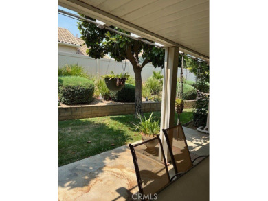 Tivioli Plan 200 on quiet street - upgraded cabinets in kitchen on Sun Lakes Country Club in California - for sale on GolfHomes.com, golf home, golf lot