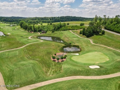 Experience the epitome of luxury living with this gorgeous golf on Wind River Golf Course in Tennessee - for sale on GolfHomes.com, golf home, golf lot