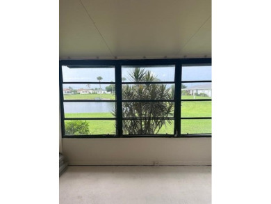 Move in ready 2 bedroom, 2 bathroom, updated villa with 2 on Cypress Lakes Golf Course - West Palm Beach in Florida - for sale on GolfHomes.com, golf home, golf lot
