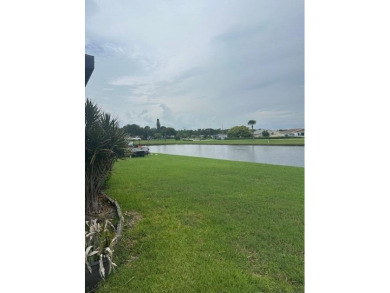 Move in ready 2 bedroom, 2 bathroom, updated villa with 2 on Cypress Lakes Golf Course - West Palm Beach in Florida - for sale on GolfHomes.com, golf home, golf lot