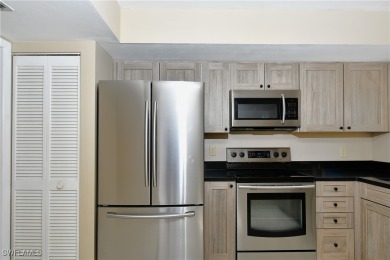 This beautiful lakefront 2BR/2Bath condo with a screened lanai on Cross Creek Country Club in Florida - for sale on GolfHomes.com, golf home, golf lot