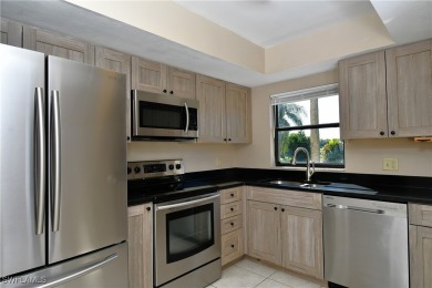 This beautiful lakefront 2BR/2Bath condo with a screened lanai on Cross Creek Country Club in Florida - for sale on GolfHomes.com, golf home, golf lot