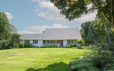 Spacious home with a large living room featuring a wood-burning on National Golf Links of America in New York - for sale on GolfHomes.com, golf home, golf lot