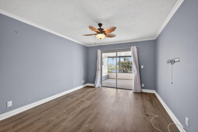Move in ready 2 bedroom, 2 bathroom, updated villa with 2 on Cypress Lakes Golf Course - West Palm Beach in Florida - for sale on GolfHomes.com, golf home, golf lot