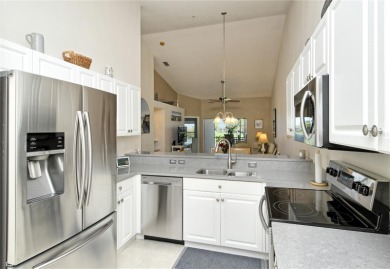 Come take a look at this outstanding, second floor *Barrington* on Heritage Oaks Golf and Country Club in Florida - for sale on GolfHomes.com, golf home, golf lot