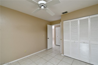 This beautiful lakefront 2BR/2Bath condo with a screened lanai on Cross Creek Country Club in Florida - for sale on GolfHomes.com, golf home, golf lot