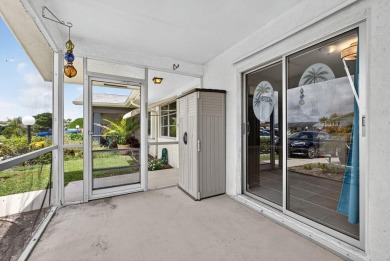 Move in ready 2 bedroom, 2 bathroom, updated villa with 2 on Cypress Lakes Golf Course - West Palm Beach in Florida - for sale on GolfHomes.com, golf home, golf lot