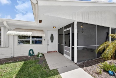 Move in ready 2 bedroom, 2 bathroom, updated villa with 2 on Cypress Lakes Golf Course - West Palm Beach in Florida - for sale on GolfHomes.com, golf home, golf lot