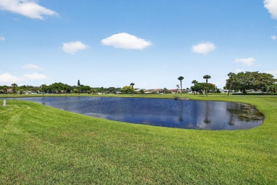 Move in ready 2 bedroom, 2 bathroom, updated villa with 2 on Cypress Lakes Golf Course - West Palm Beach in Florida - for sale on GolfHomes.com, golf home, golf lot