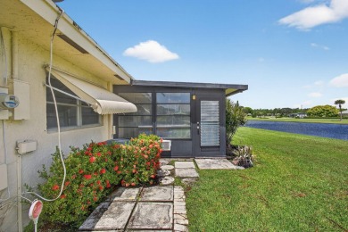 Move in ready 2 bedroom, 2 bathroom, updated villa with 2 on Cypress Lakes Golf Course - West Palm Beach in Florida - for sale on GolfHomes.com, golf home, golf lot