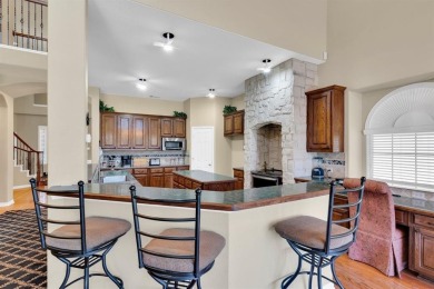 Welcome to this stunning home perfectly situated next to the on Mansfield National Golf Club in Texas - for sale on GolfHomes.com, golf home, golf lot
