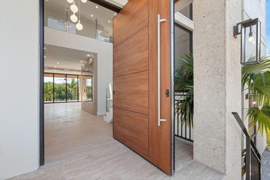 Brand new 2025 waterfront masterpiece. 5 bed, 4 bath, 3,580 sf on Key Colony Beach Golf Course in Florida - for sale on GolfHomes.com, golf home, golf lot