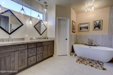 Discover refined living in this spacious 4-bedroom, 4-bath on Prescott Lakes Golf and Country Club in Arizona - for sale on GolfHomes.com, golf home, golf lot