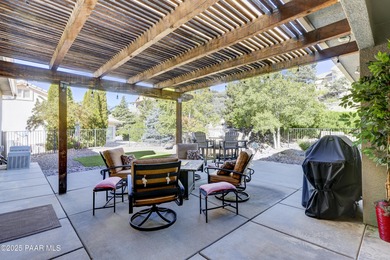 Discover refined living in this spacious 4-bedroom, 4-bath on Prescott Lakes Golf and Country Club in Arizona - for sale on GolfHomes.com, golf home, golf lot