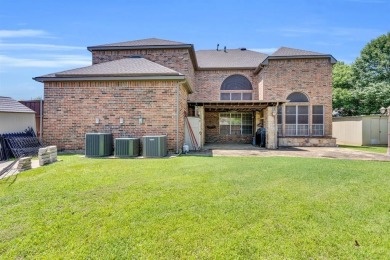 Welcome to this stunning home perfectly situated next to the on Mansfield National Golf Club in Texas - for sale on GolfHomes.com, golf home, golf lot