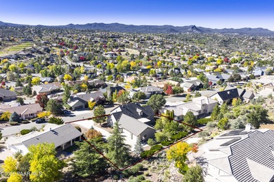 Discover refined living in this spacious 4-bedroom, 4-bath on Prescott Lakes Golf and Country Club in Arizona - for sale on GolfHomes.com, golf home, golf lot