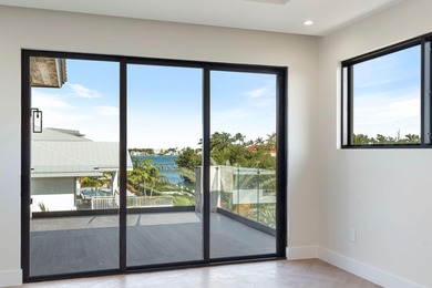 Brand new 2025 waterfront masterpiece. 5 bed, 4 bath, 3,580 sf on Key Colony Beach Golf Course in Florida - for sale on GolfHomes.com, golf home, golf lot