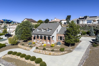 Discover refined living in this spacious 4-bedroom, 4-bath on Prescott Lakes Golf and Country Club in Arizona - for sale on GolfHomes.com, golf home, golf lot